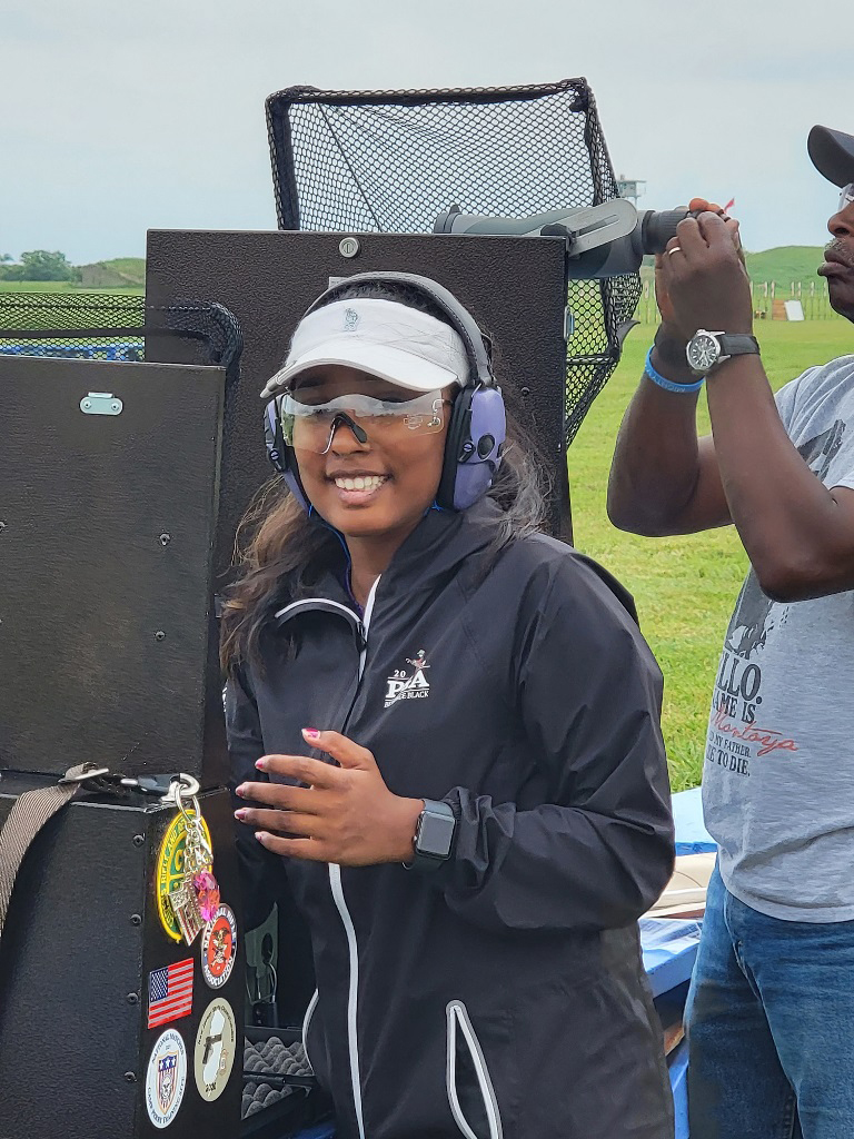 Tanya smiles on the range.