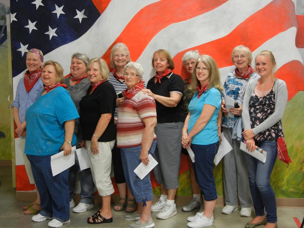 Ruth Ann Anderson (back row, third from left) helped start a local air gun group for women called the Annie OAKlies. The OAKlies, spouses and friends all shoot for fun during the Open Public Nights at Camp Perry.