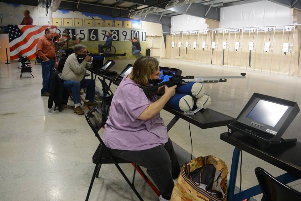 In the Bench League, competitors fire 30 shots from a rested position atop “bean bags” or blocks. Participants may use sporter rifles (background), precision rifles (foreground), or AiR15 air rifles.