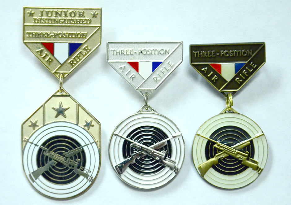 CMP awards bronze and silver EIC badges along with the gold Junior Air Rifle Distinguished Badge. 