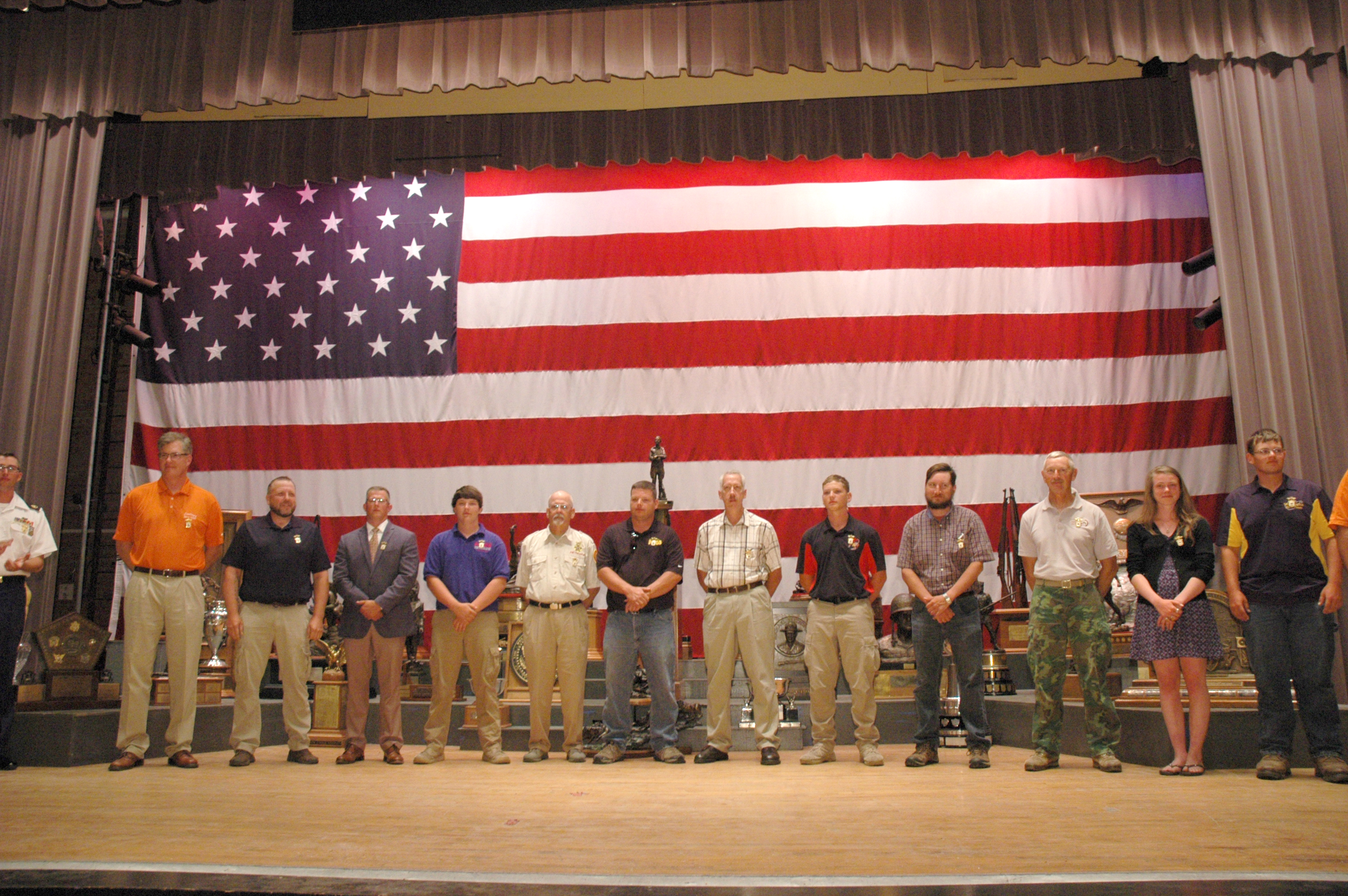 During the CMP Awards Ceremonies, civilians that earn 30 points or more towards their Distinguished Badge are awarded on stage.