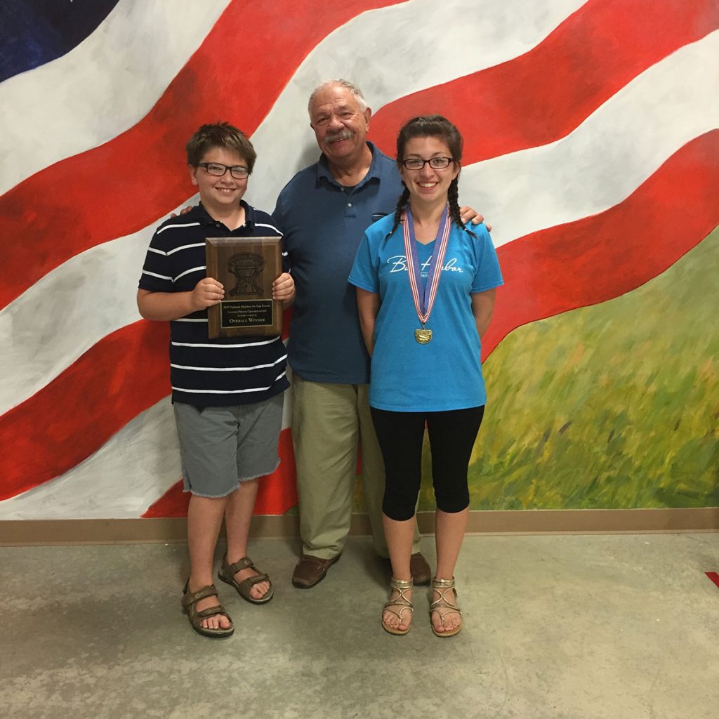 Family affair at the NMAGE this summer. Jaren won novice prone, grandpa Chris Mullis won Top Center Shot and Brooke took 2nd in Top Center shot. 