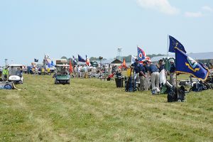 Teams fly their colors along the firing line during the NTT match, proudly displaying from where they come. 