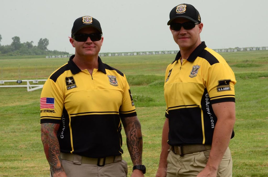 SFC Patrick Franks (left) and his brother SPC Ryan Franks (right) both earned Distinguished Badges on July 7 – Patrick for .22 Rimfire Pistol and Ryan for Service Pistol.