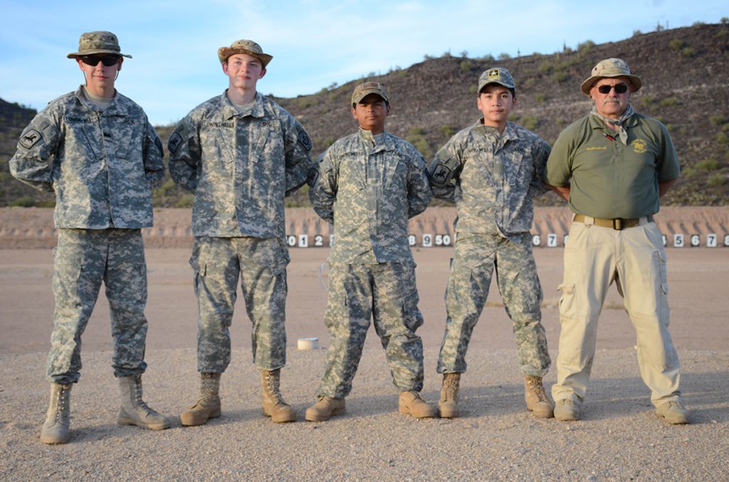 Cody (far left) and other members of the Flowing Wells JROTC attended SAFS for the first time. Coach Jeff Schneider (far right), served as an instructor during the course.