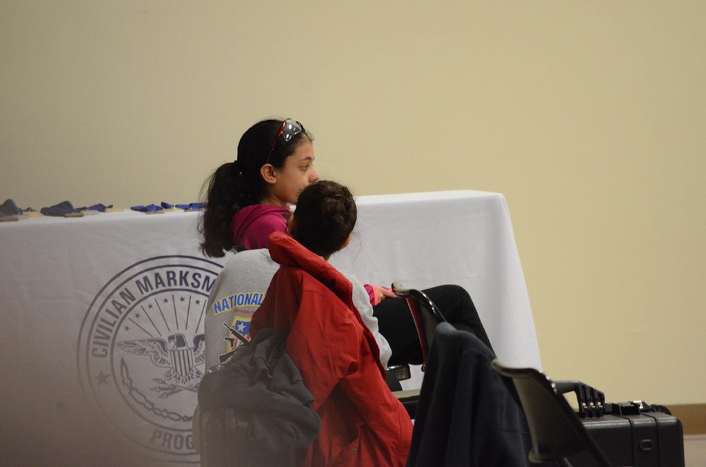 Aliya stood behind Emma and offered her support as she competed.