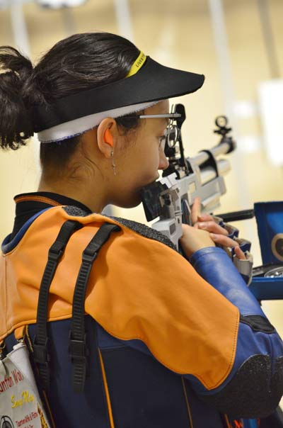 Sonya May, of Rockland, Massachusetts, contemplates a shot during her championship performance during the 2013 Camp Perry Open 3x20 precision air rifle class competition.