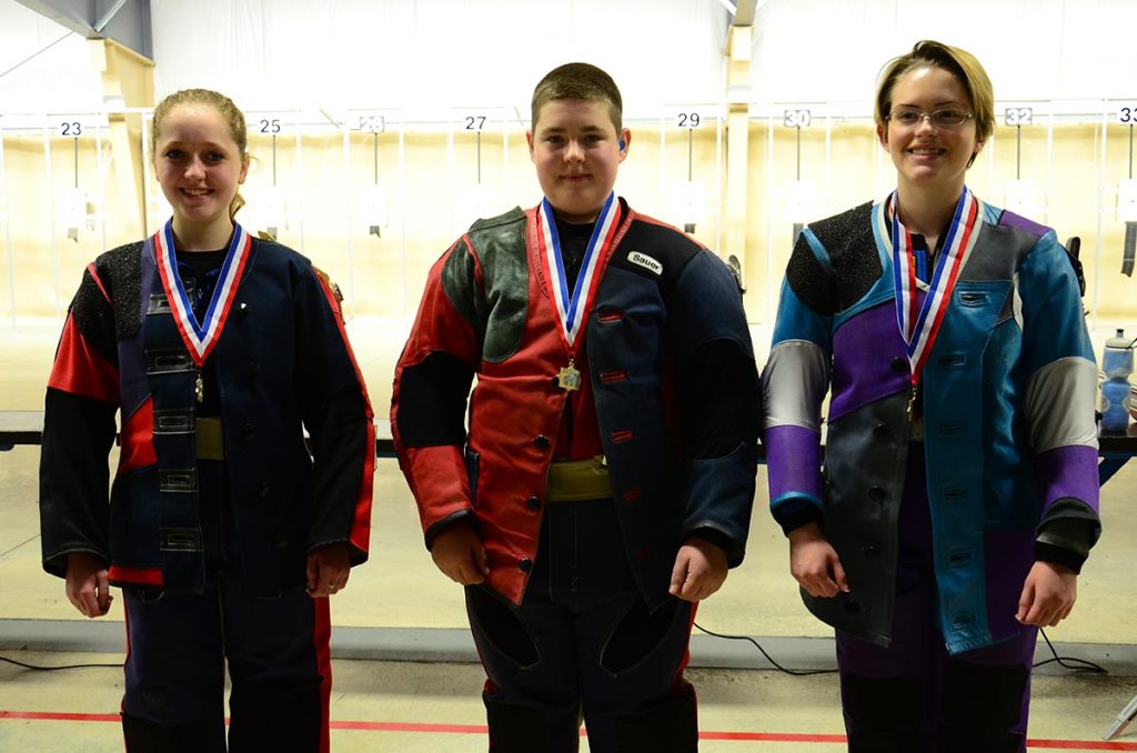 The top three Precision juniors on Day 2 of the 2015 JROTC National Championship. Daniel Enger, of Walla Walla HS AJROTC, WA, took first followed by Taylor Gibson, left, of North Salem HS AJROTC, OR, placed second and Mary Pratt, right, of Monroe HS AFJROTC, GA, placed third.