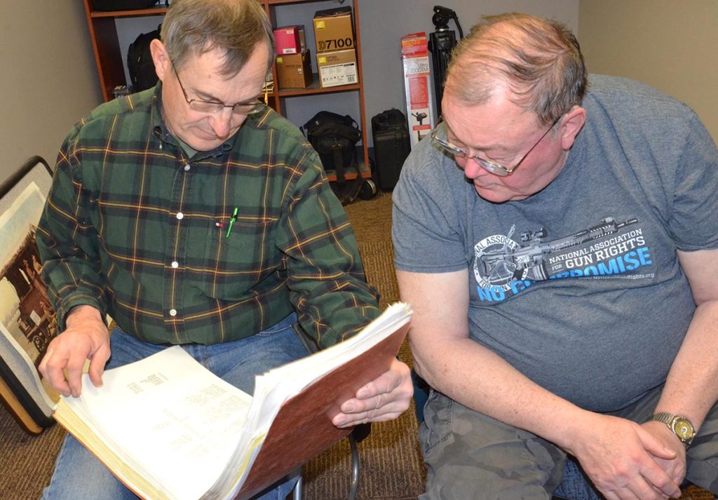 Pat (left) has collected all of the league score sheets since the mid-1970s. He keeps them all in his own personal record book as a way of honoring the history of the club.