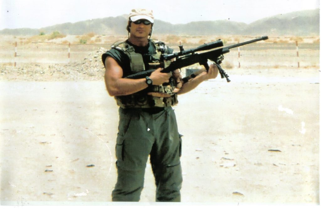 Steve Sciarabba with his M24 Sniper Weapon System (SWS) on mission with US Armed Forces, Afghanistan in 2004  