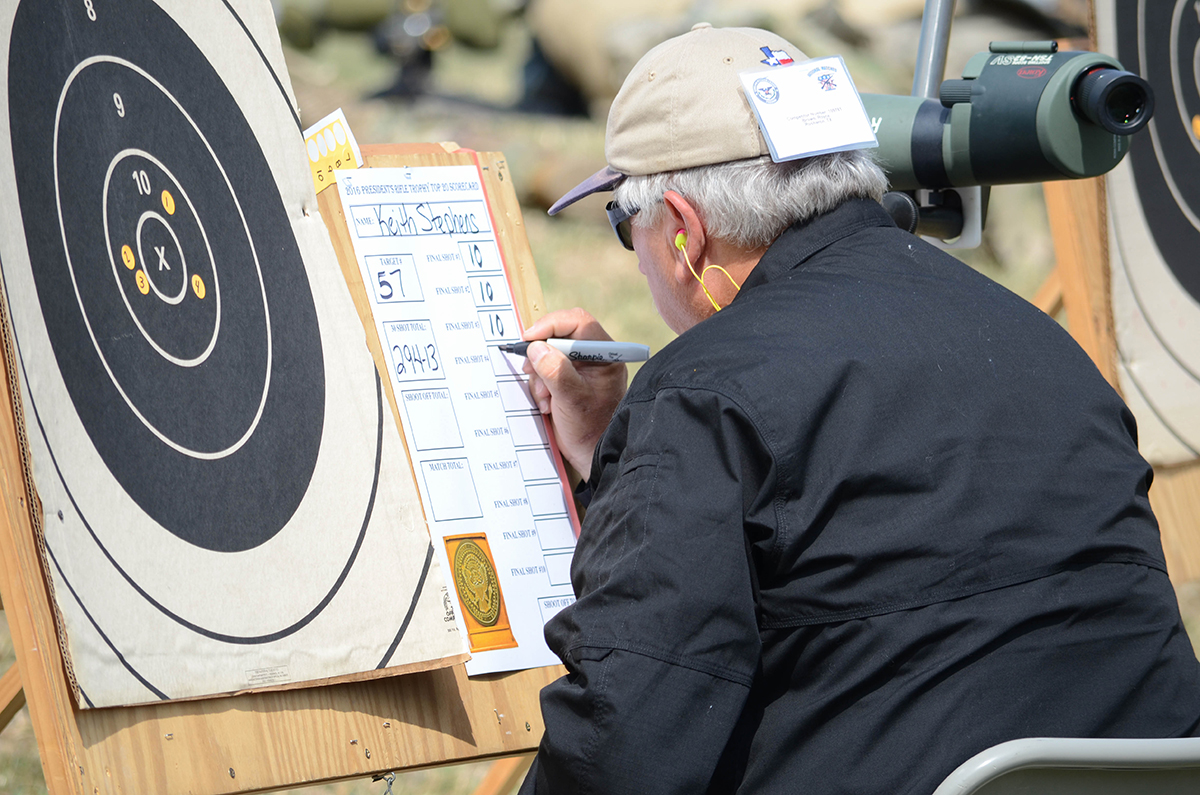 During the Shoot Off, scores are marked on oversized targets to allow the crowd to see how each competitor is faring. 