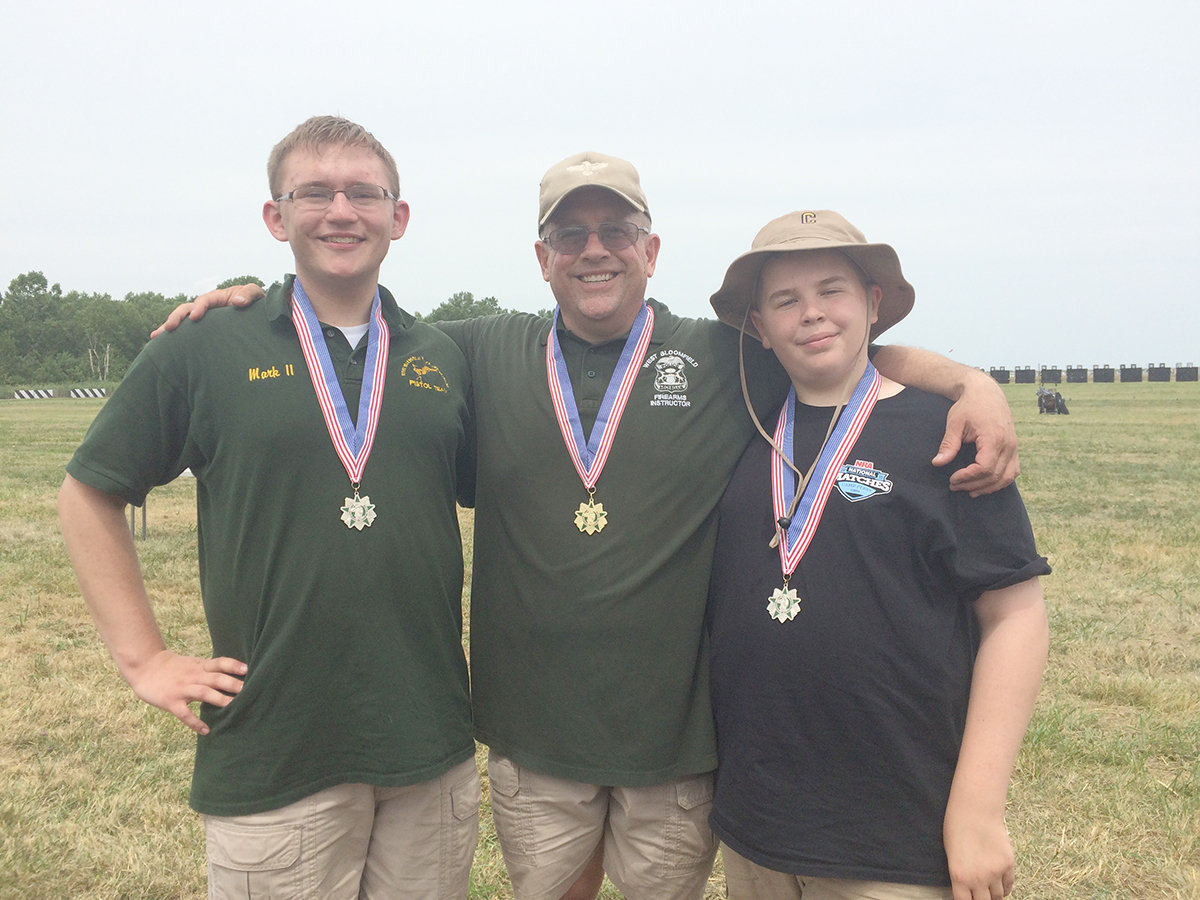 Mark Stout earned the top spot in the National Carbine Match while his sons, Mark Jr. and Connor, finished first and second, respectively, among the junior competitors. Left to right: Mark Jr., Mark Sr. and Connor.