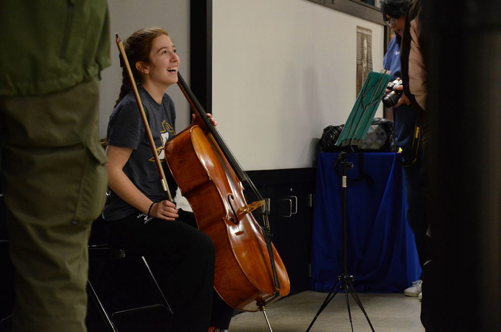 Air rifle competitor Elizabeth Bark, 18, was bringing her cello back to the University of Akron when she decided to break it out and play during the Super Final.