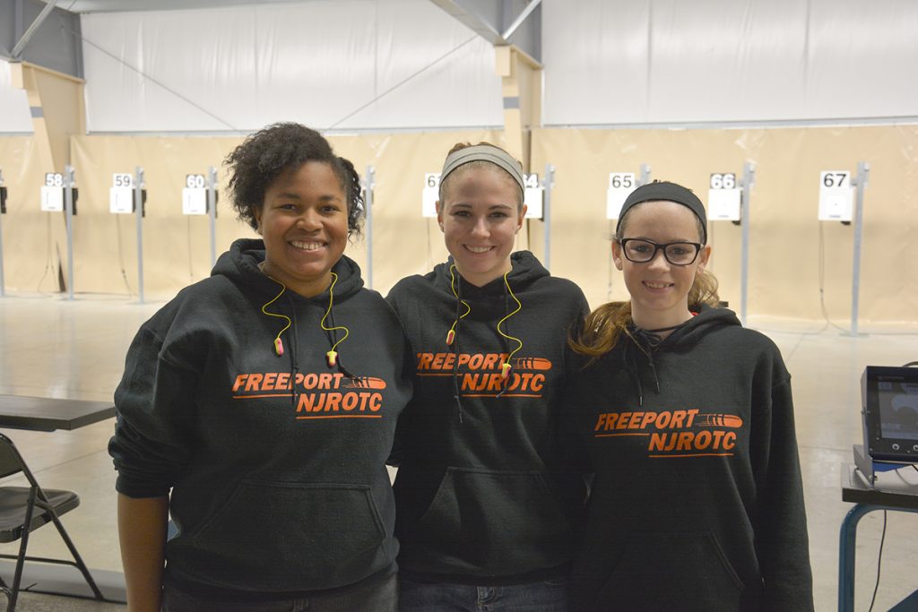 Emma Thompson (center) set nine new National Records at the event, even breaking three records she had set previously. 