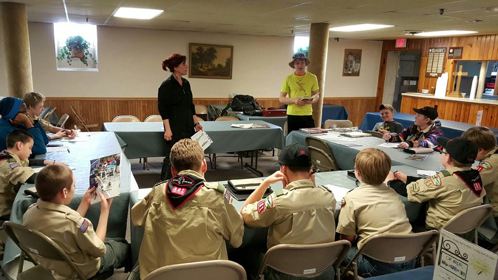 An adult leader assisted with a local Boy Scout Troop earning their Rifle Shooting Merit Badge 