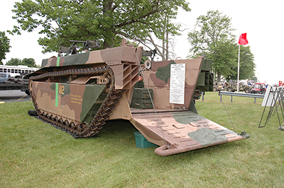 A World War II AMTRAC, amphibious beach landing craft, was brought on a large truck bed and set up for display in the Petrarca Range parking lot. Spectators were able to climb inside of the vehicle for an up close look.