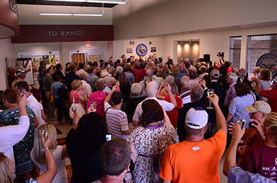 Guests collected within the reception area of the center for a standing-room-only champagne toast during the Dedication Target unveiling.